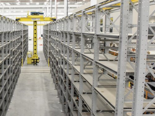 High density die storage with small overhead crane on the racks